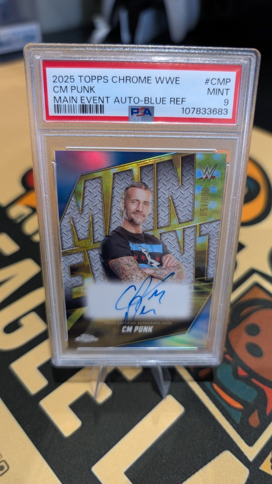 CM Punk - 2025 Topps Chrome WWE Main Event Blue Auto 060/150 SSP - PSA 9 Mint