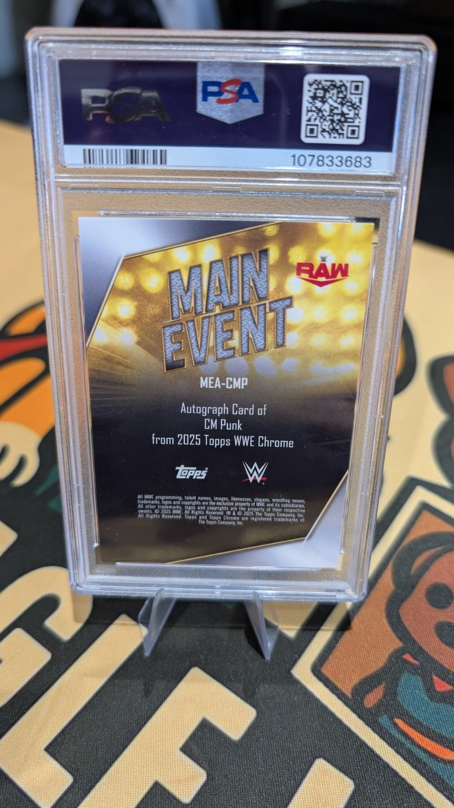 CM Punk - 2025 Topps Chrome WWE Main Event Blue Auto 060/150 SSP - PSA 9 Mint