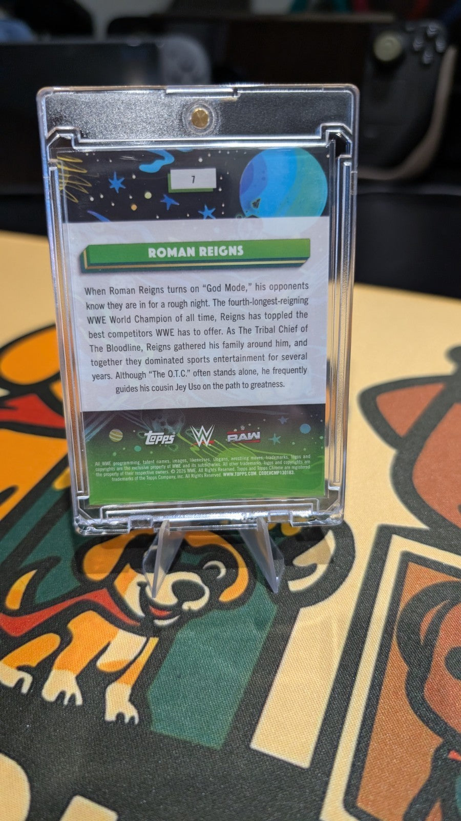 2026 Topps Cosmic Chrome WWE Roman Reigns #7 "Magenta Cosmos Refractor" /299