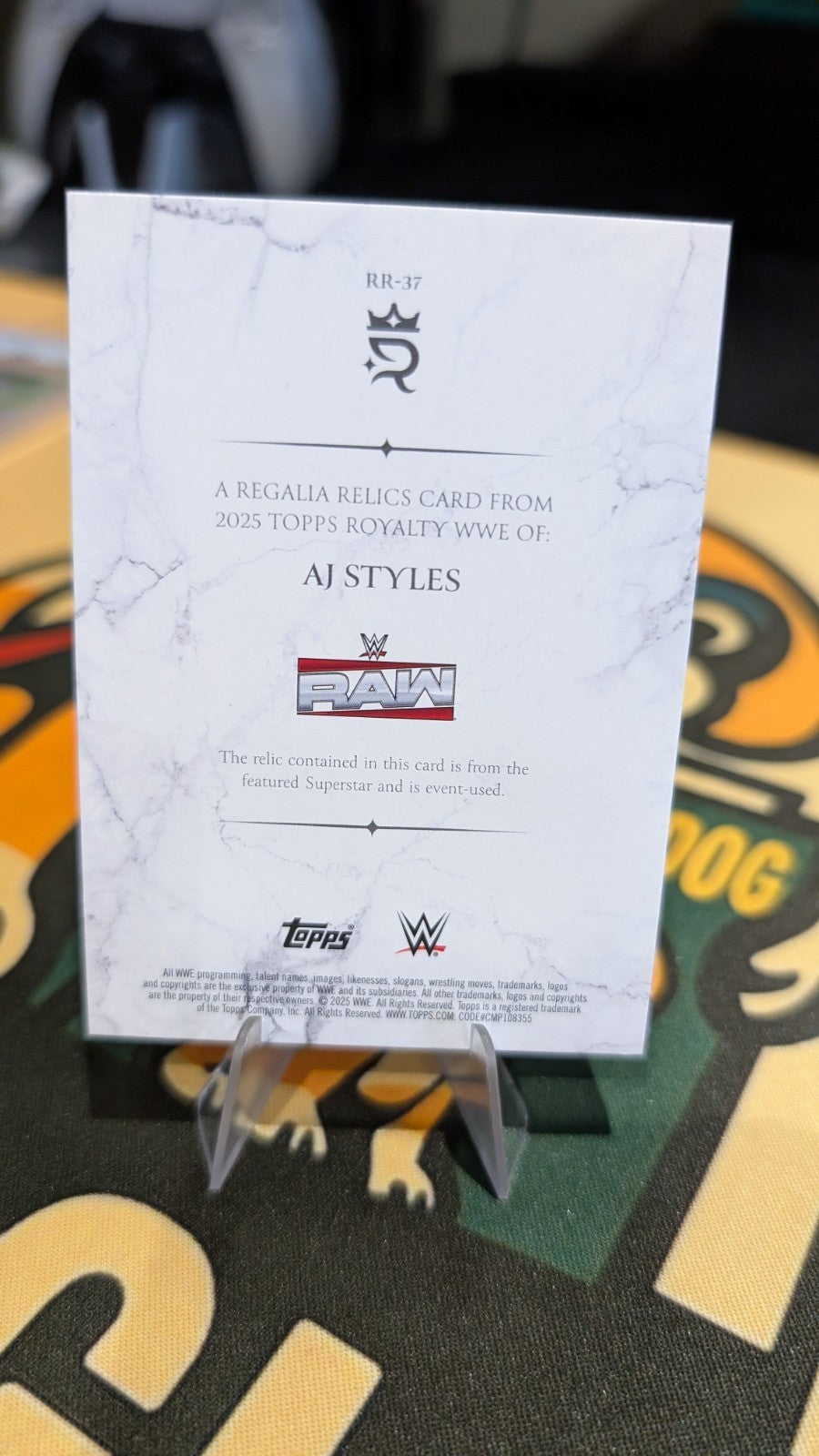 2025 Topps Royalty WWE #RR-37 AJ Styles Regalia Relics #/99